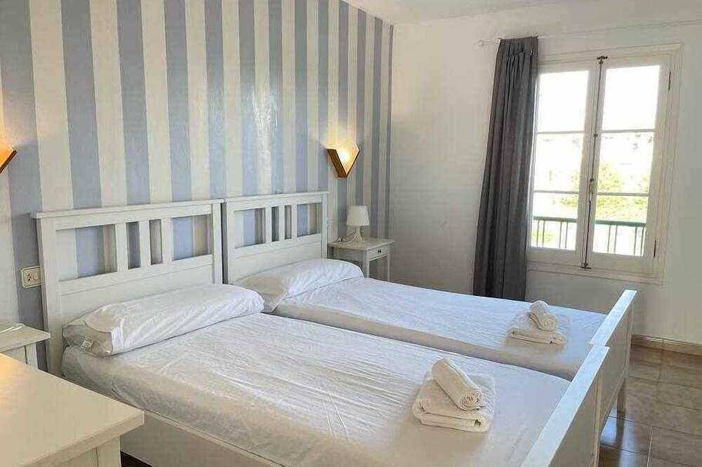 Apartamento entero, Pregonda - Apartamento con piscina y junto a playa in Cala Blanes, Ciudadela