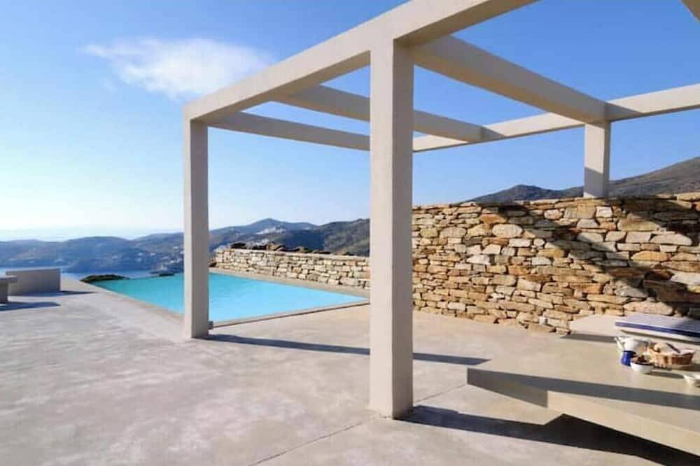 Stemma Stone Villa | Sunset Sea Views & Private Pool Above Mylopotas Beach in Mylopotas, Ios