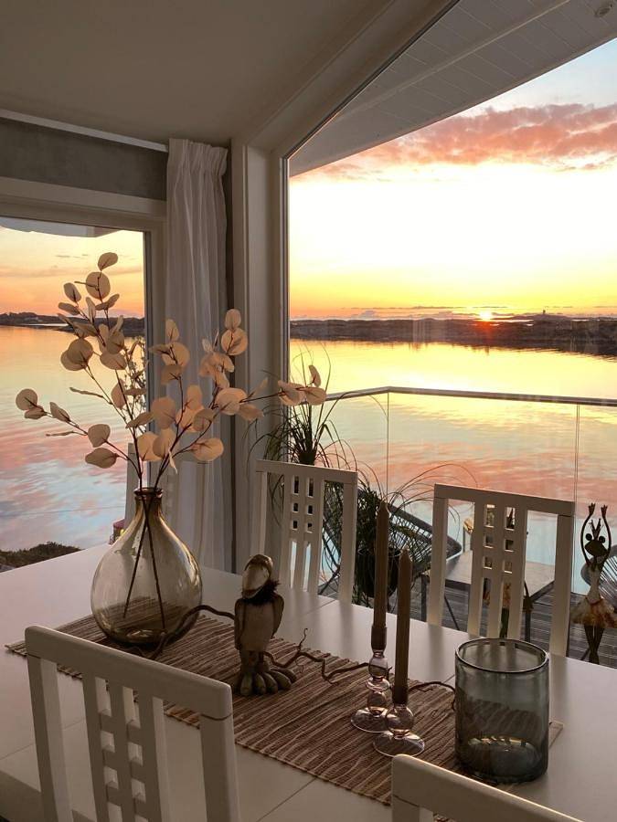 Ferienwohnung für 8 Personen, mit Terrasse und Garten sowie Ausblick, mit Haustier in Eide