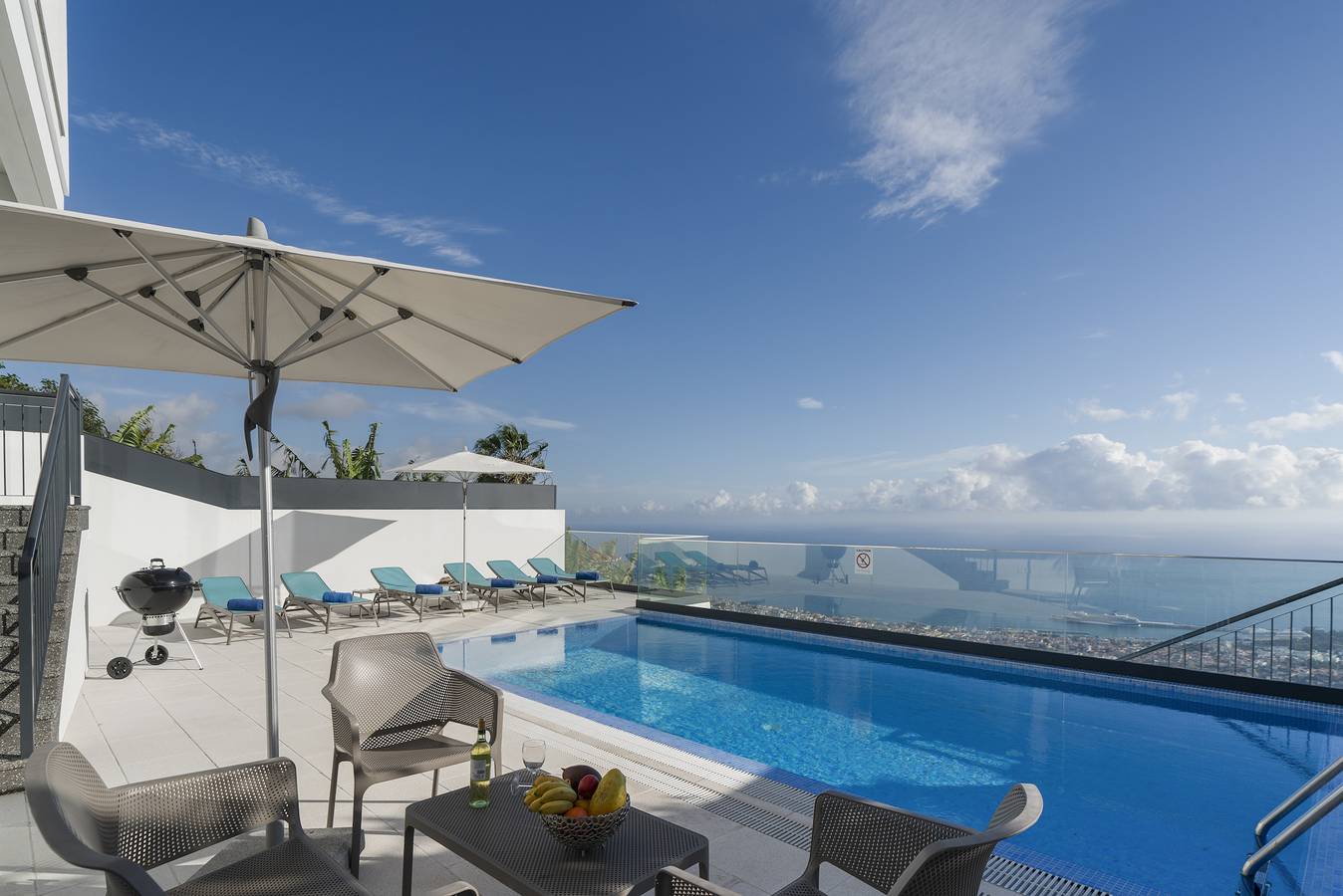 A balcony over Funchal and sea | Monte White House in Monte (Madeira), Madeira