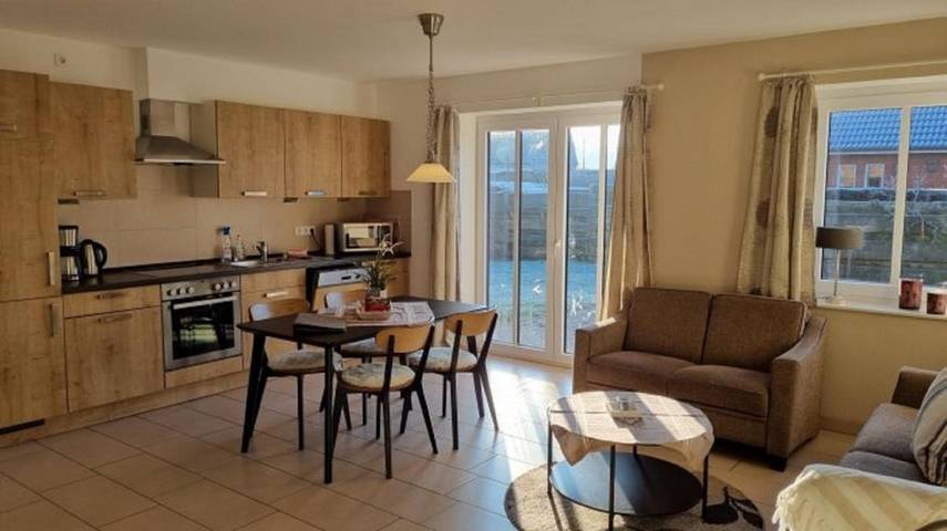 Ferienwohnung für 3 Personen, mit Terrasse und Garten sowie Sauna und Ausblick in Leck