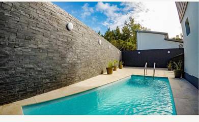 Gîte pour 4 personnes, avec jardin et bassin pour enfant ainsi que vue et piscine dans Piton de la Fournaise