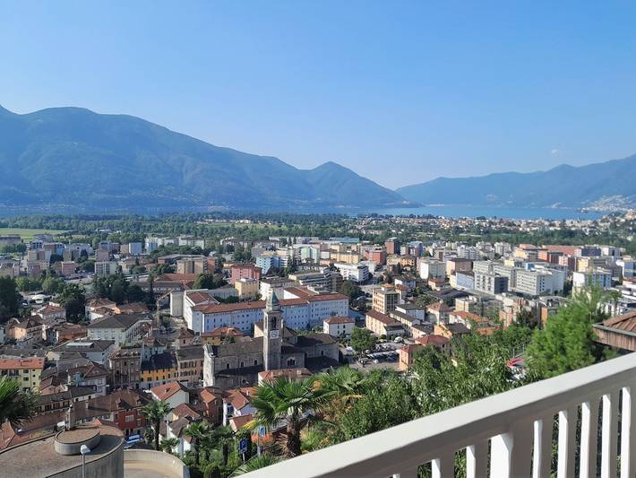 Entire apartment, Spacious attic apartment with panoramic views, patio and sunbathing area in Locarno, Ticino Alps and Verbano
