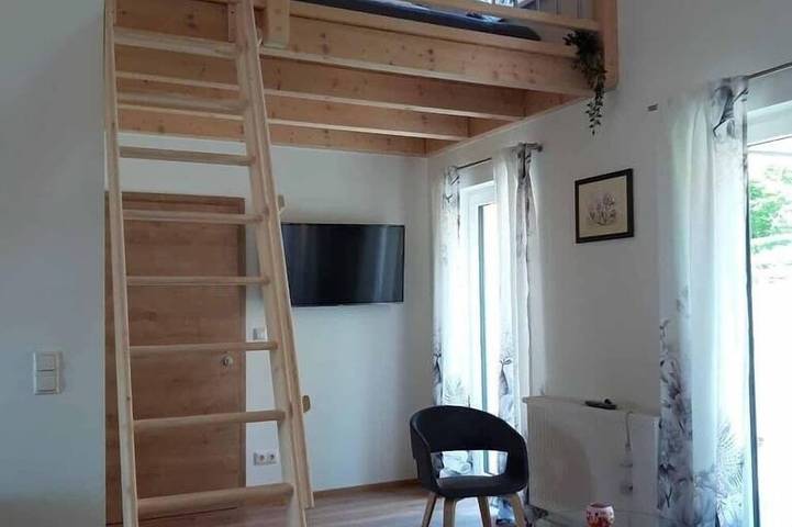 Ferienwohnung für 4 Personen, mit Balkon und Garten sowie Sauna