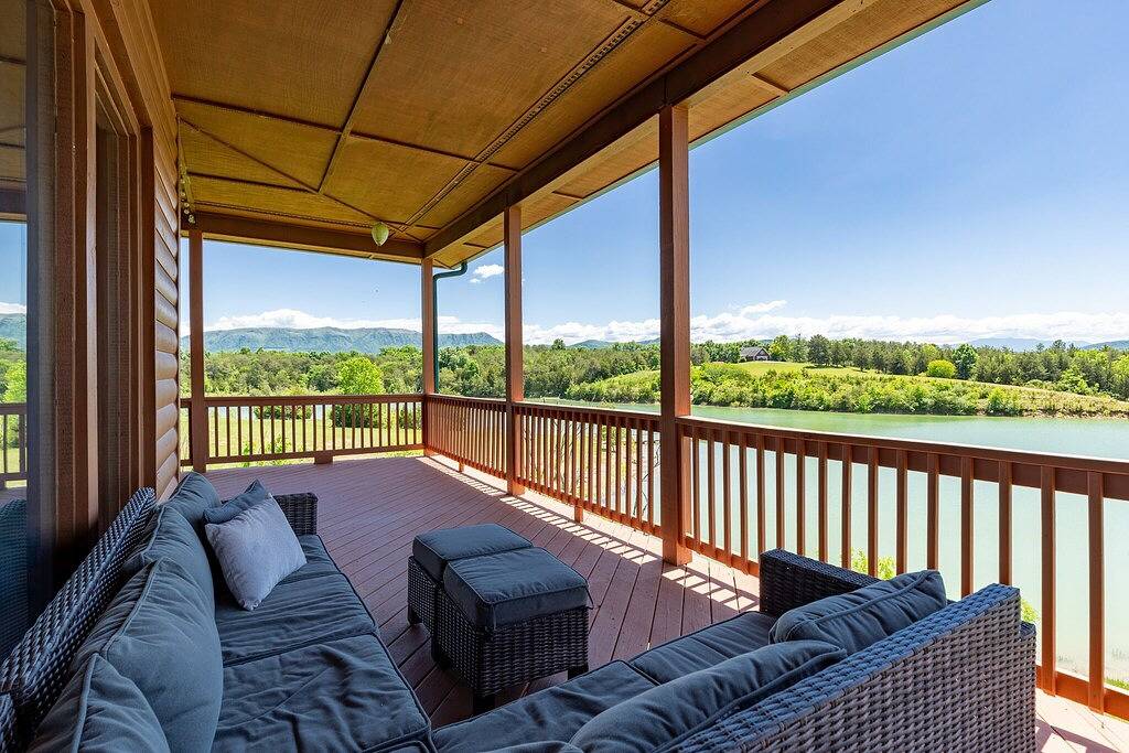 Pet-Friendly Luxury Home With Incredible Outdoor Living, Private Dock + Hot Tub in Douglas Lake