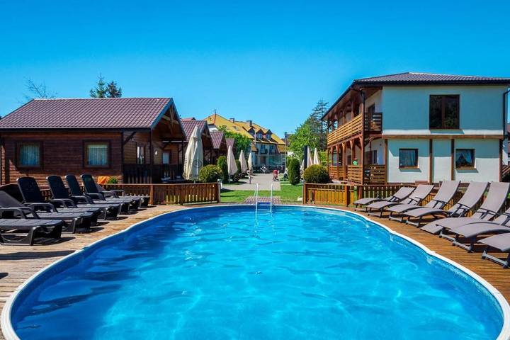 Wynajem wakacyjny dla 4 osób, z Balkon i Jacuzzi oraz Taras i Ogród w Dąbki