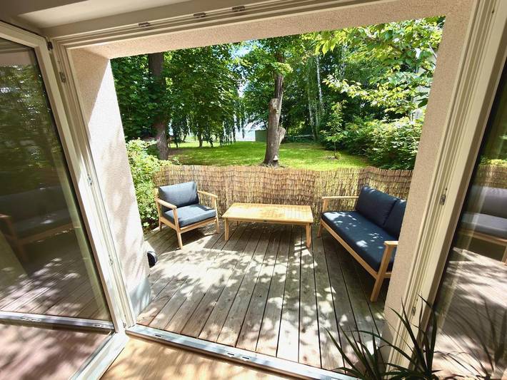 Ferienhaus für 3 Personen, mit Terrasse und Garten sowie Seeblick und Ausblick in Senftenberg