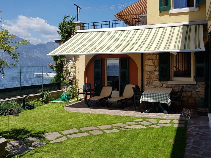 Casa sulla spiaggia per 7 persone, con giardino in 