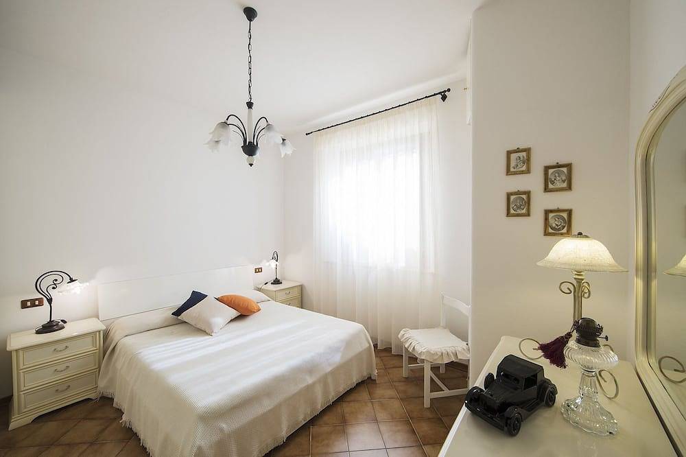 Podere La Rosa, Wohnung in offener Landschaft, aber 5 Gehminuten vom Zentrum entfernt. in San Quirico d'Orcia, Orciatal