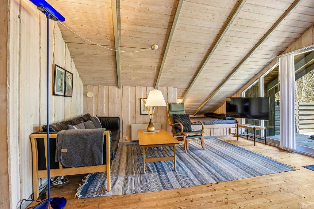 Charmantes Ferienhaus mit Kaminofen im Wald in Ho in Ho, Varde