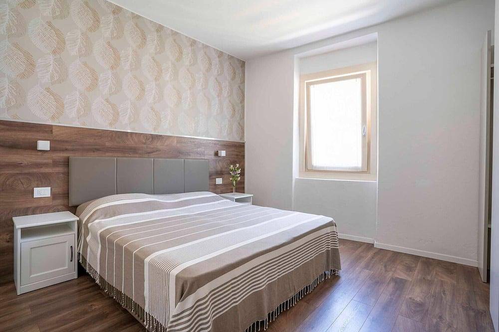 Geheel appartement, Appartement in Mezzolago met Ledromeer Uitzicht in Mezzolago, Ledro