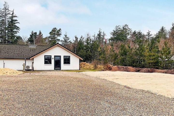 Ferienhaus für 12 Personen, mit Pool und Whirlpool sowie Terrasse und Sauna in Henne Strand