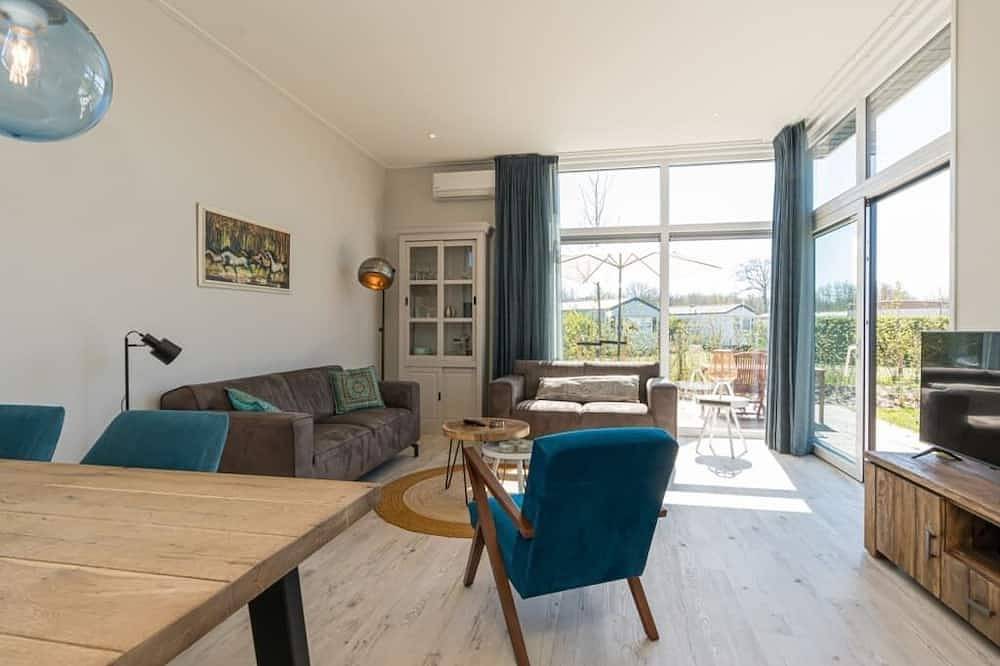 Dieses Chalet für 4 Personen heißt Sie am Rande des Parks willkommen. Das Chalet verfügt über ein mo in Burgh-Haamstede, Zeeuwse Kust
