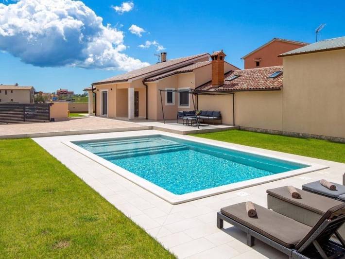 Ferienhaus für 8 Personen, mit Garten