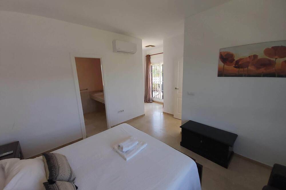 Luxury villa with private pool overlooking golf course, close to beach in Playa Nueva Umbría, El Portil