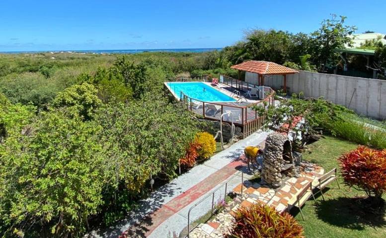 Gîte pour 6 personnes, avec vue et bassin pour enfant ainsi que piscine et jardin dans Plage du Grand Macabou - 2