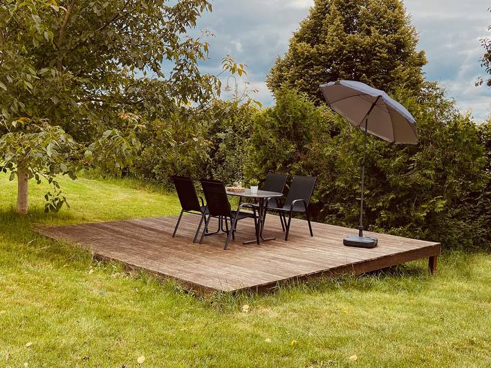 Ferienwohnung für 4 Personen, mit Balkon und Balkon/Terrasse sowie Terrasse und Garten