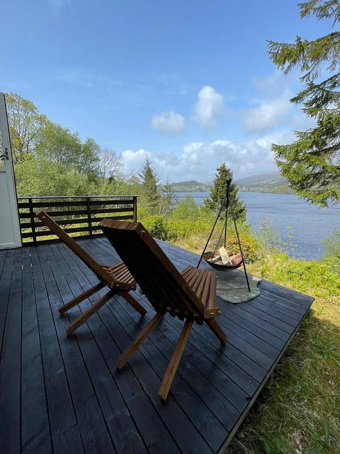 Ganze Wohnung, Cabin with a view to water in Fitjar