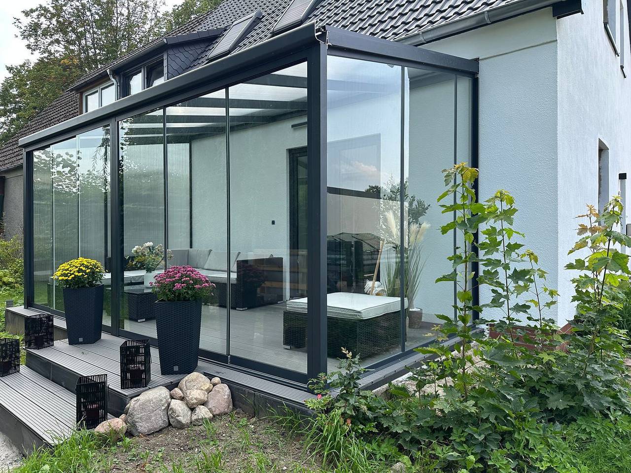 Ganze Wohnung, Moderne Ferienwohnung im Eg mit Wintergarten in Rechlin unweit der Müritz in Rechlin, Müritz