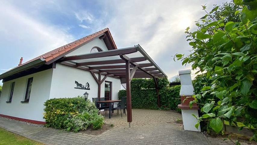 Ferienhaus für 4 Personen, mit Terrasse und Ausblick sowie Garten und Seeblick in Neu Bartelshagen