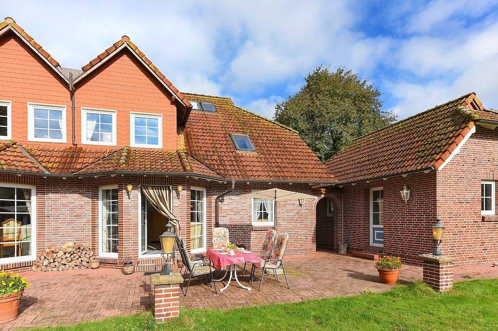 Ganze Wohnung, Ferienwohnung Löwenzahn - Ferienwohnungen Kornblume und Löwenzahn im Haus in Dunum, Nordseeküste
