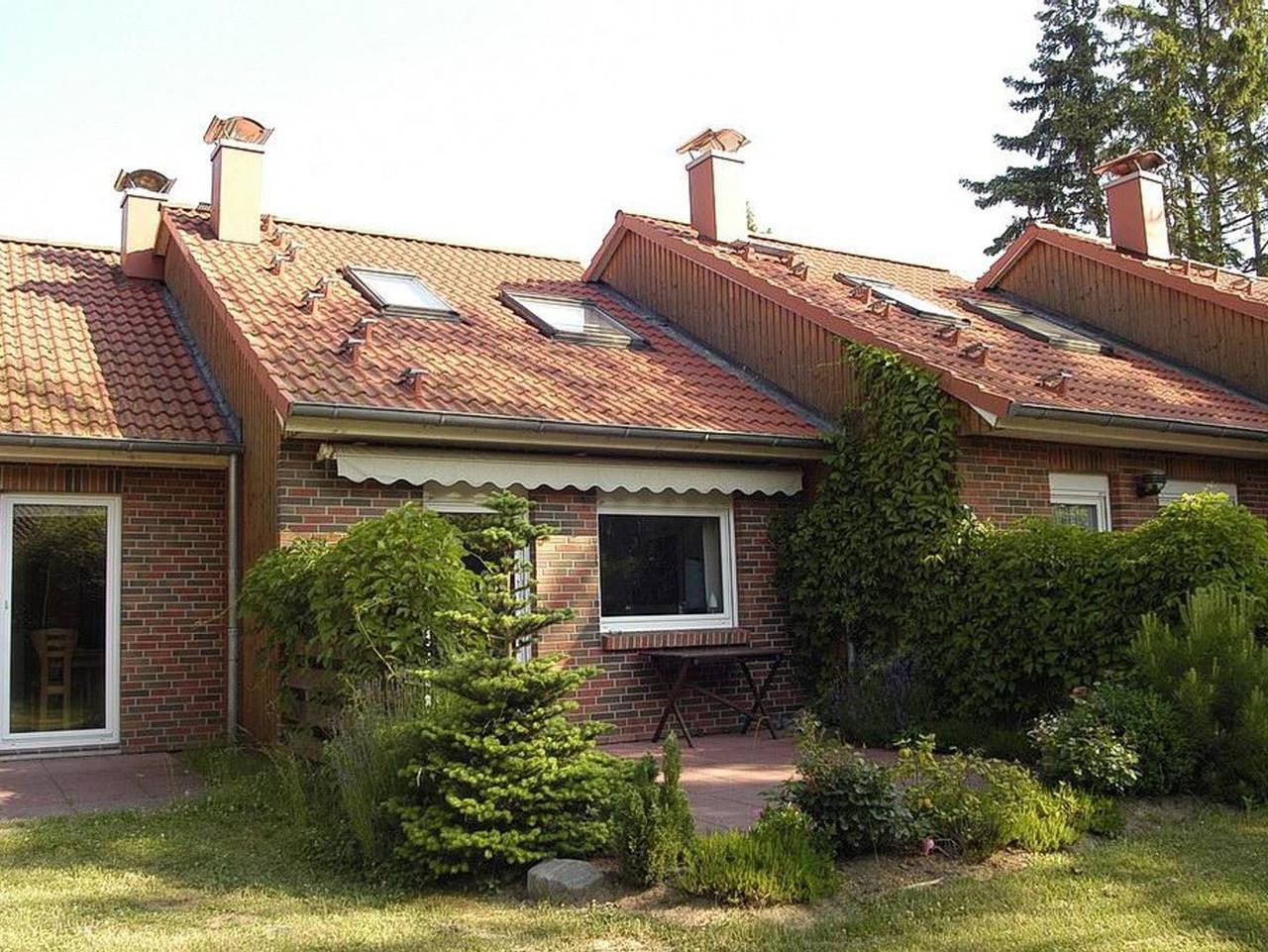 Urlauberdorf - Familienfreundliches Ferienhaus mit Terrasse, Kaminofen, 2 Bädern und Spielplatz in Boltenhagen, Nordwestmecklenburg (Wismar und Umgebung)