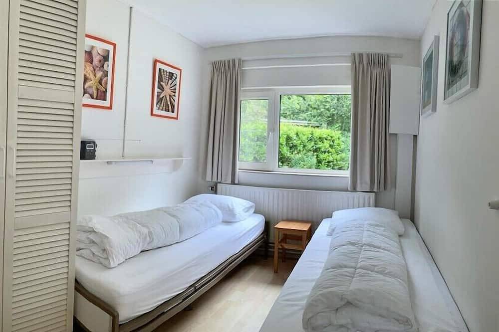 Duinoord 22 Bungalow con mucha libertad personal en un lugar verde de vacaciones in Playa de Renesse, Renesse