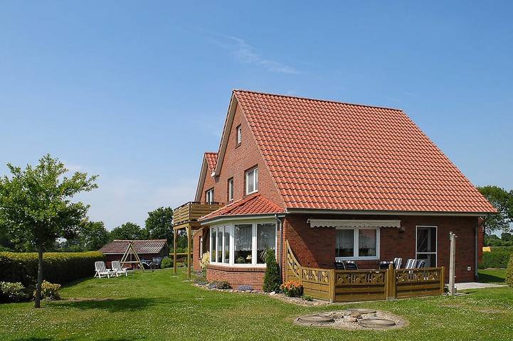 Ferienwohnung für 4 Personen, mit Garten und Balkon in Dunum