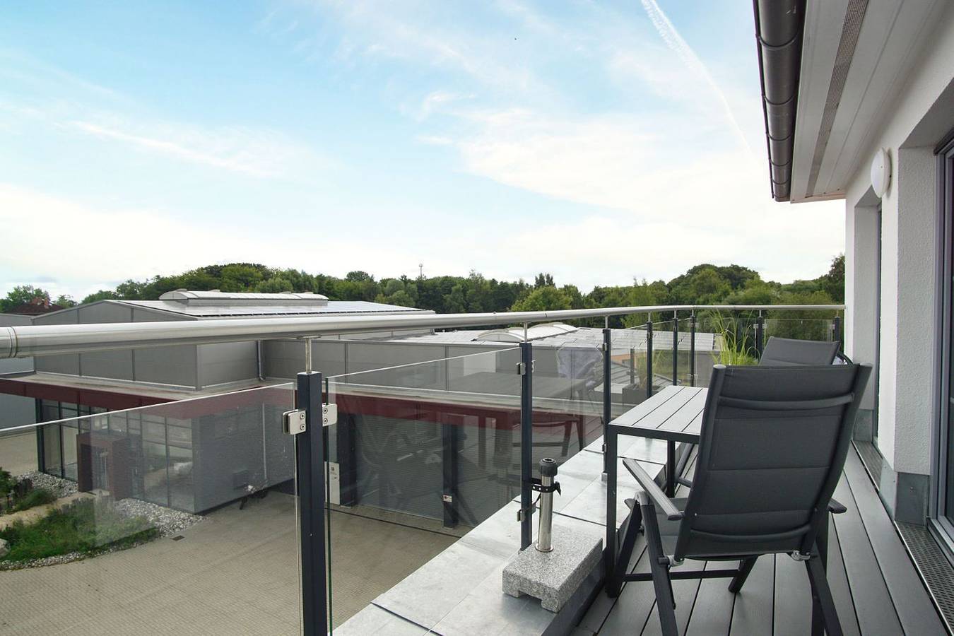 Ganze Wohnung, Modernen Ferienwohnung mit Balkon, Kamin - Alte Fischfabrik Lauterbach Fewo 13 in Lauterbach (Rügen), Putbus