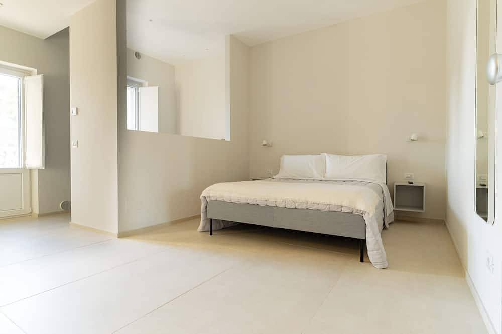 Appartamento intero, Sassi di Matera loft con balcone - free parking in Matera, Piana del Metaponto