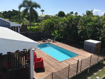 Cottage pour 4 personnes, avec vue ainsi que jardin et piscine dans Golf international de Saint François