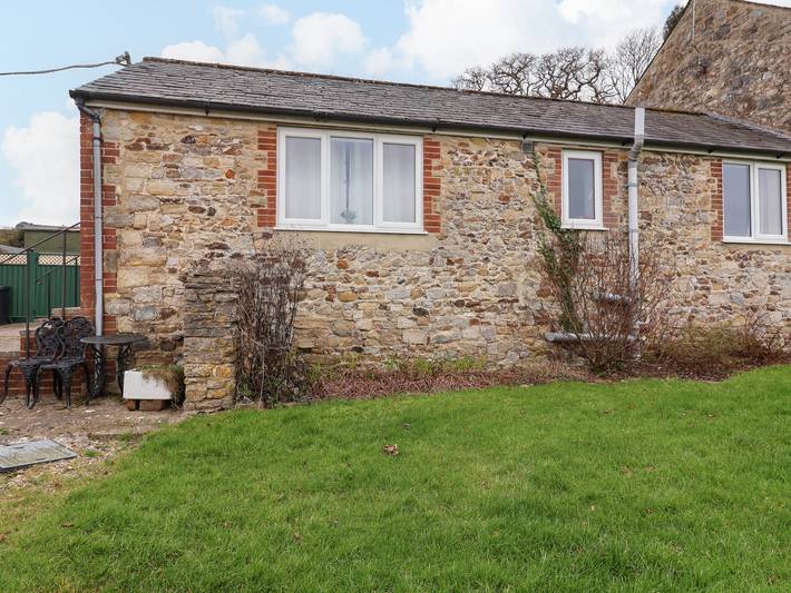 Log cabin for 3 people, with garden, with pets in Lyme Regis