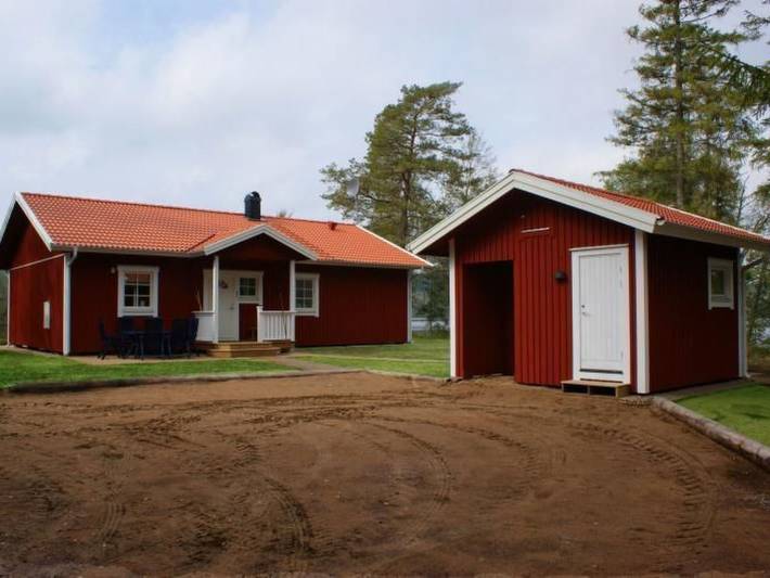 Gemütliches Holzhaus Udden mit eigenem Boot in Västergötland