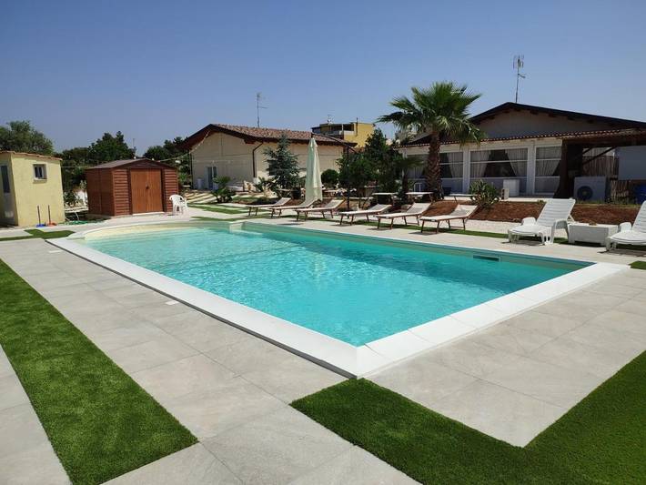 Casa vacanza per 6 persone, con Idromassaggio e Giardino nonché Piscina e Sauna a Palagiano