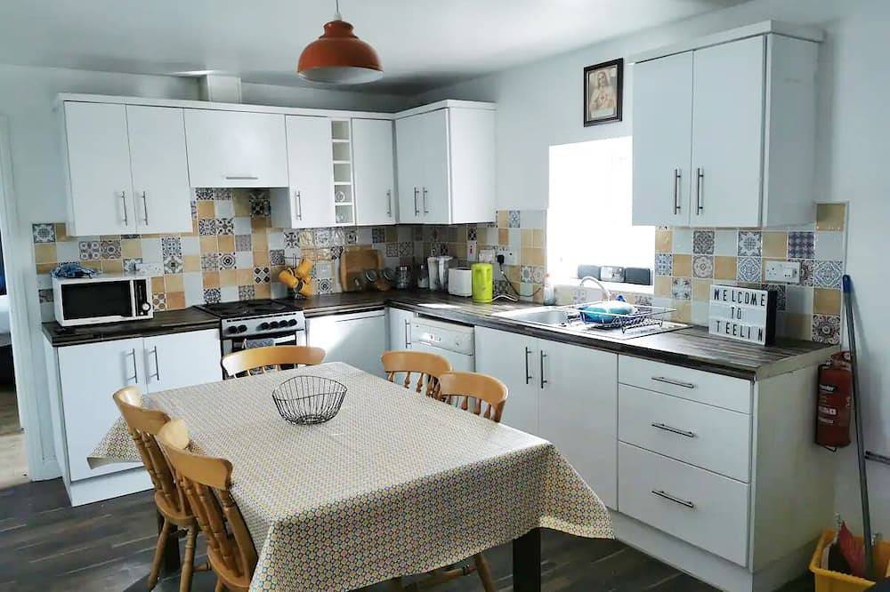 Teach Condy's Cottage nestled at the bottom of Sliabh Liag Cliffs, Co. Donegal in Donegal, County Donegal