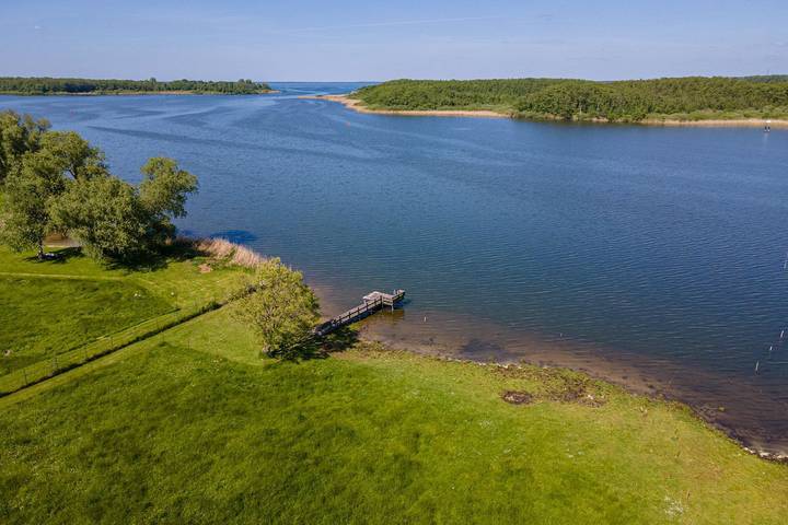 Ferienwohnung für 4 Personen, mit Terrasse und Garten sowie Seeblick und Ausblick an der Müritz