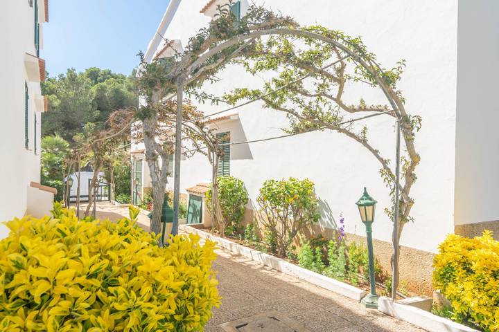 Appartement de vacances entier, Ses Fonts C25 - Appartement confortable avec piscine partagée et proche de la plage. Wi-Fi gratuit. in Son Parc, Es Mercadal