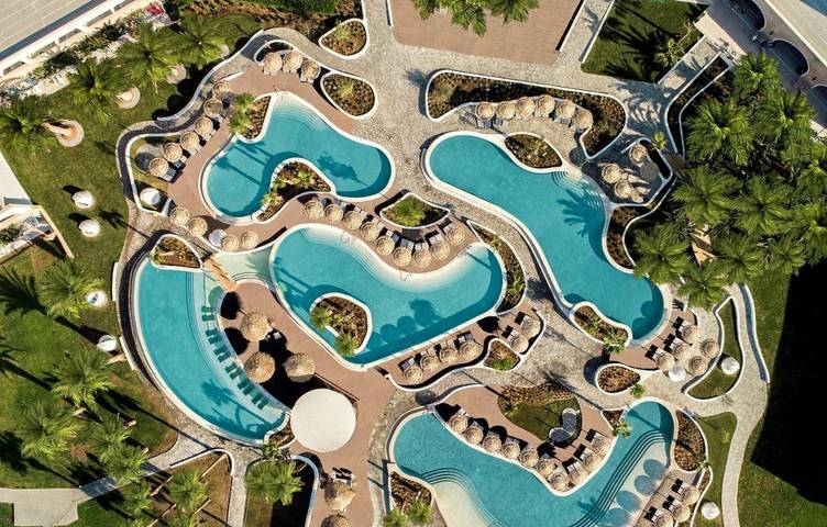 Resort per 4 persone, con piscina per bambini e giardino nonché piscina e panorama a Kos
