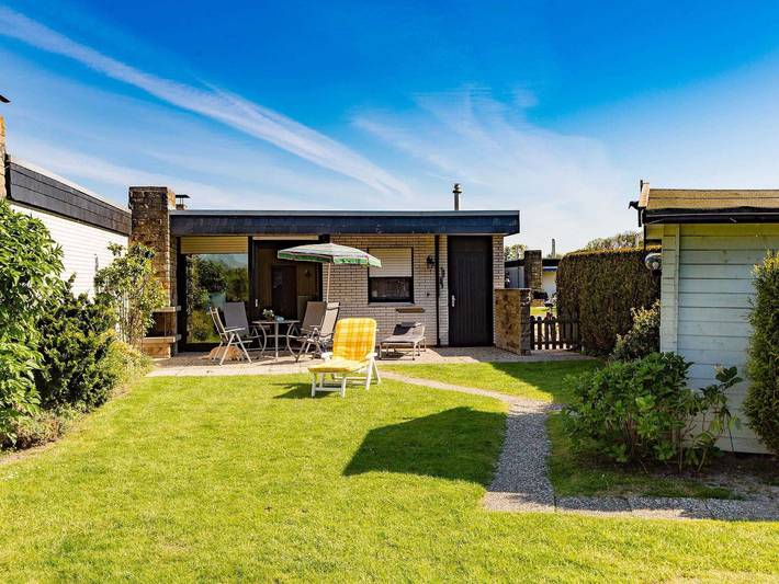 Ferienwohnung für 4 Personen, mit Garten und Ausblick sowie Seeblick und Terrasse, mit Haustier in Tossens