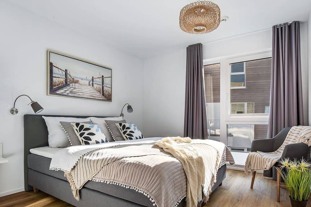 Ganze Wohnung, Hafen Loft - Infrarot-Sauna, Balkon, Strandkorb, Wasserblick, E-Auto Ladestation in Olpenitz, Kappeln