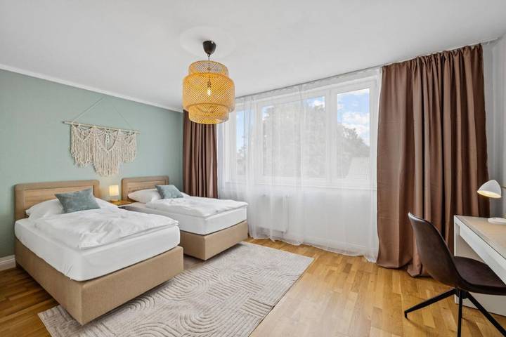 Ferienwohnung für 5 Personen, mit Balkon und Garten sowie Ausblick