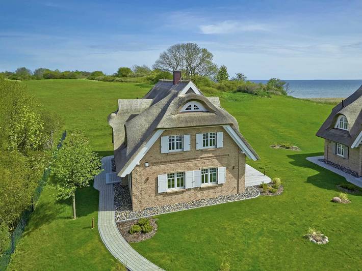 Ferienhaus für 6 Personen, mit Terrasse und Garten sowie Sauna und Ausblick in Lobbe