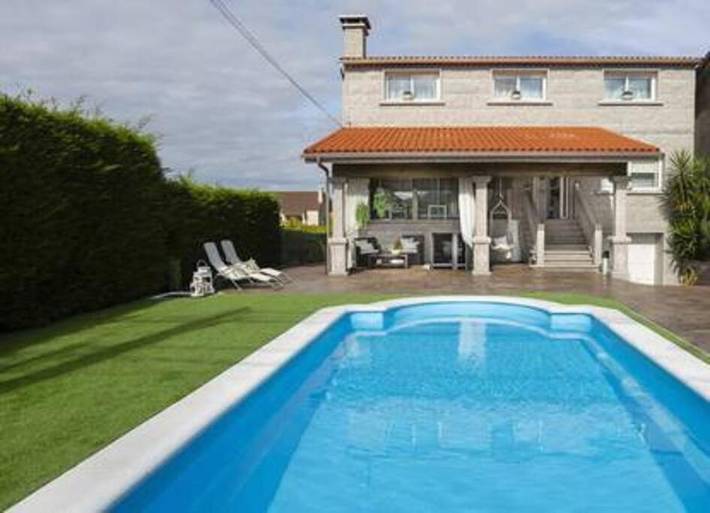 Apartamento para 8 personas, con jardín además de balcón y piscina en Ribadumia