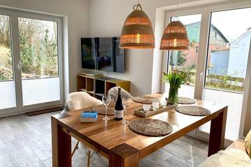 Ferienhaus für 4 Personen, mit Terrasse und Garten in Tating