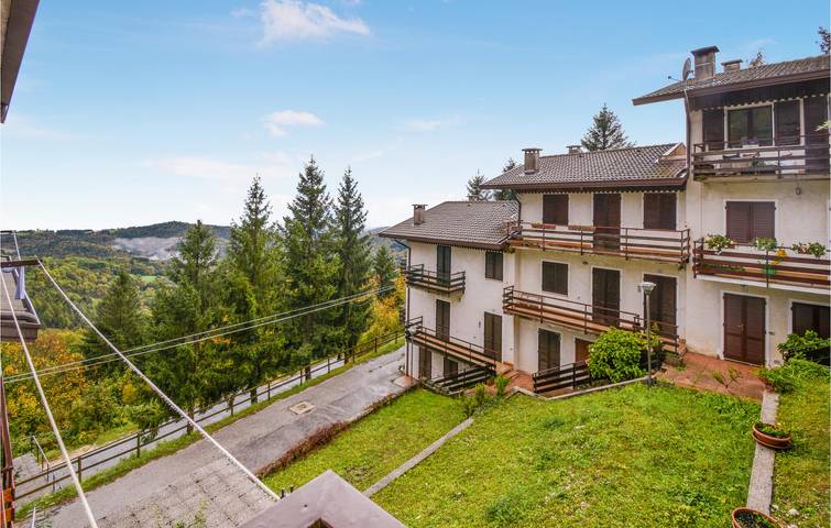 Ganze Ferienwohnung, Gemütliches 1BR Apt mit Parkplatz, Terrasse, & Küche - Nähe Skilift & Stadtzentrum in Conco, Lusiana