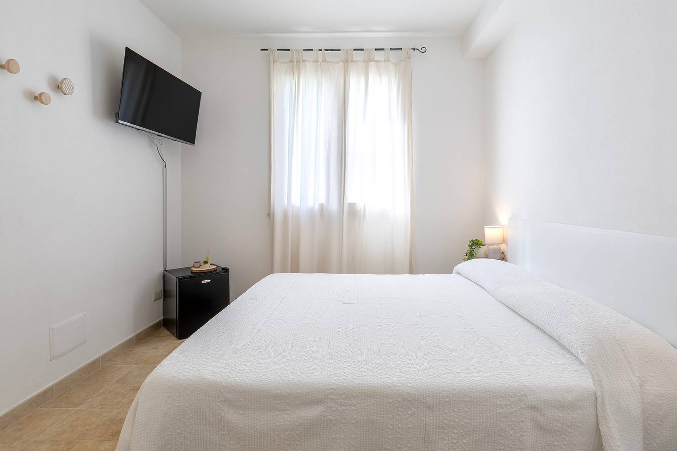 Camera 'L'Angolo- Camera 1' con terrazza in comune, Wi-Fi e aria condizionata in Porto Torres, Provincia di Sassari