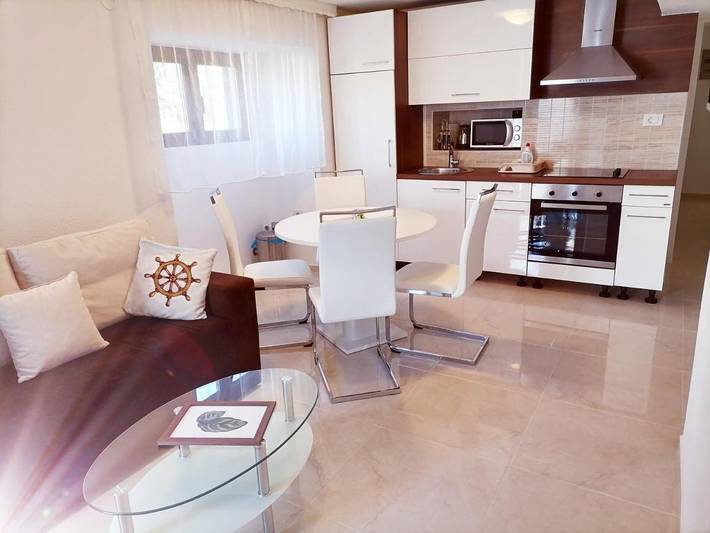 Ferienwohnung für 4 Personen, mit Balkon und Terrasse sowie Garten