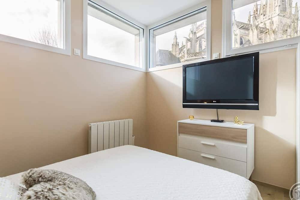 Spacious Ground-Floor Home with Private Terrace and Historic Church Views in Carentan in Carentan les Marais, Saint-Lô region