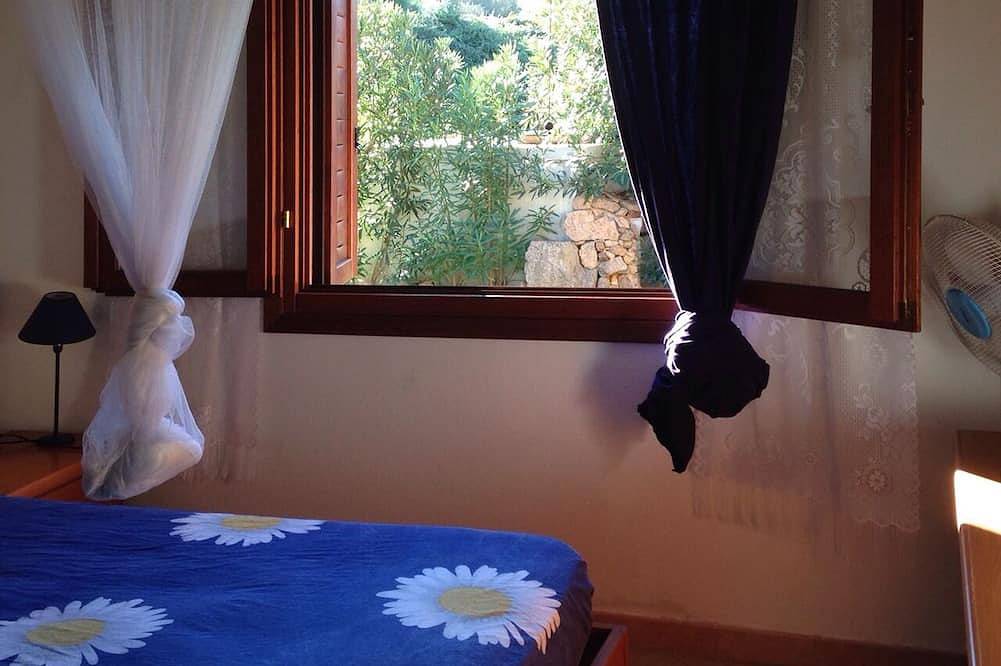 Casa Magnolia - Porzione di villa bifamiliare con giardino privato, 6 p.l. in Porto San Paolo, Loiri Porto San Paolo