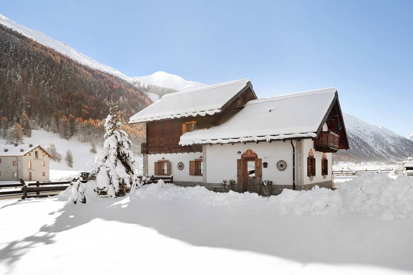 Casa vacanze Baita sulle Alpi, vista montagne, giardino, terrazza, barbecue e Wi-Fi in Livigno (Borgo), Livigno